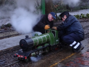 Joshua with a head of steam helped by Ian and Graham.